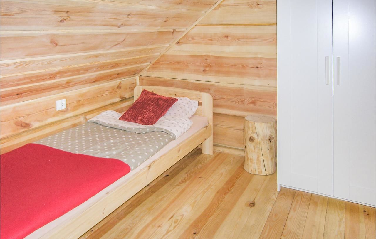 Дома для отпуска Two-Bedroom Holiday Home in Biskupiec Бискупец